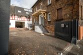 Mitten in Nidderau-Ostheim: Gleich 2 modernisierte Häuser + Hof + Scheune - - Eingang Vorderhaus
