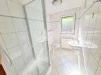 VERMIETET! Neu renoviert! Gemütliche 2 Zimmer Souterrain Wohnung inkl. Einbauküche - Steinbach/Ts - Blick ins Badezimmer