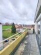 Karben-Kloppenheim: Panoramablick in großer 3 Zimmer Penthousewohnung + Einzelgarage - Ausschnitt Balkon am Wohnzimme