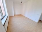 Hell und freundlich: 2 Zimmerwohnung mit Wohnküche - ruhig und zentral in Heddernheim - Ausschnitt Wohnzimmer